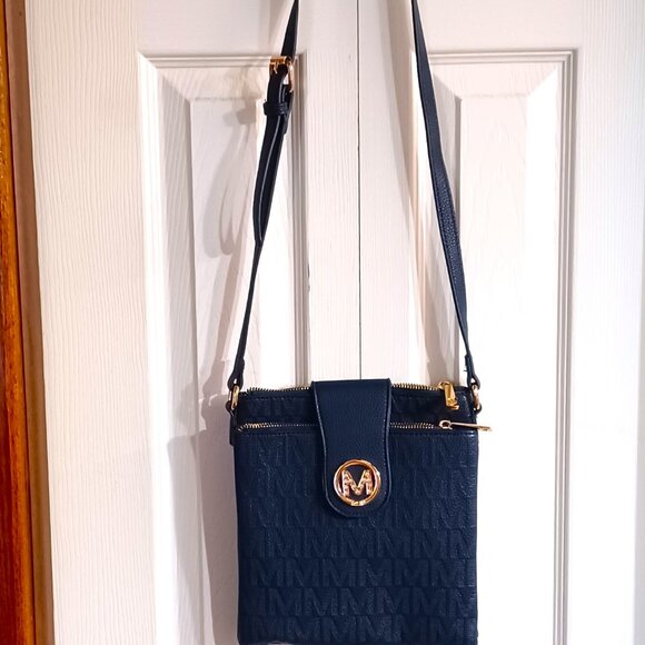 wrigley Handbags - NWOT Wrigley Signature Crossbody BLUE